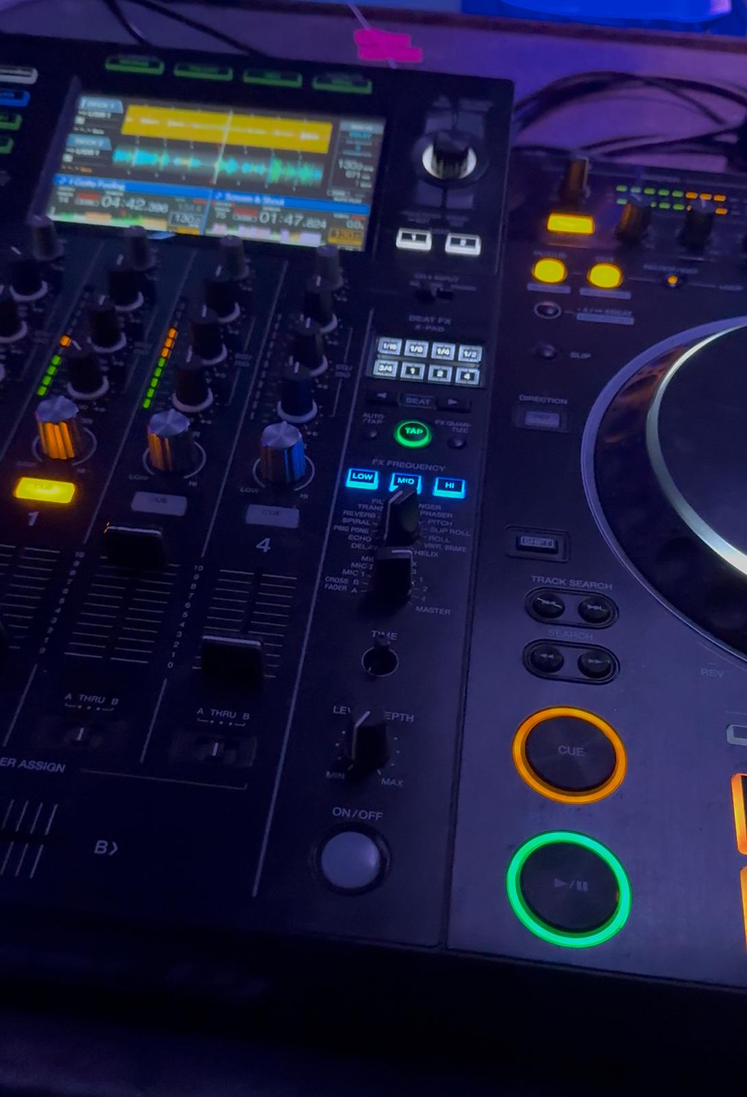 dj mixing on the disco console